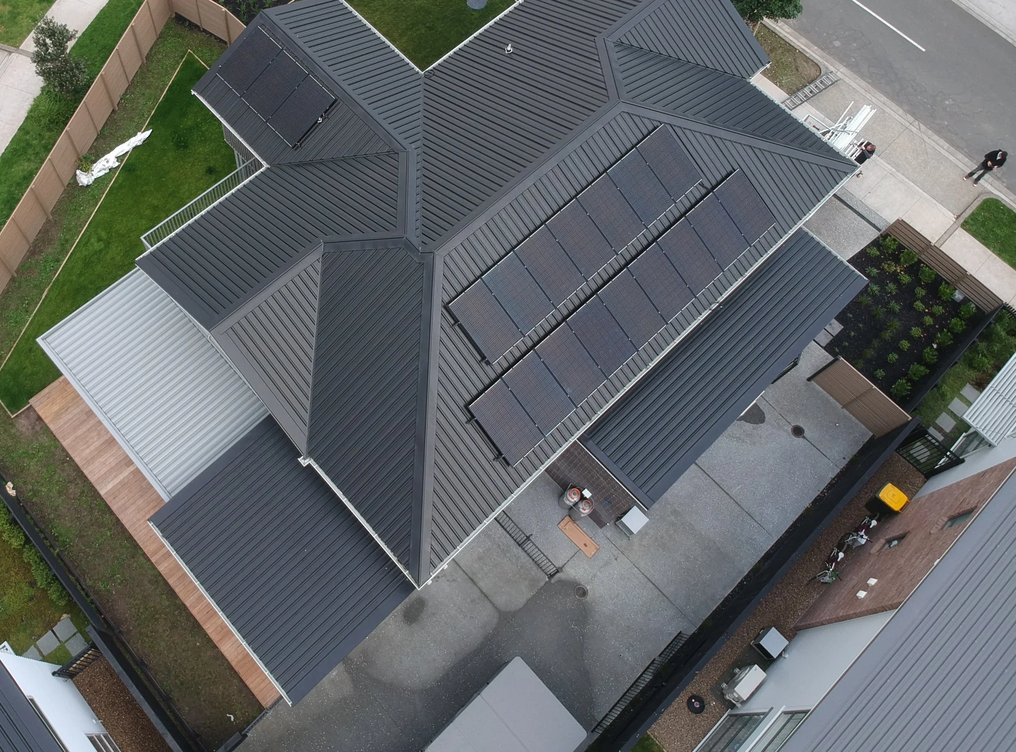 Aerial view of a home with rooftop solar panels